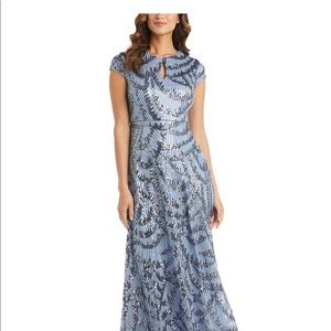 Woman’s plus size long Silver sequin evening gown